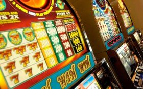 phjoy68 live roulette wheel spinning in studio with betting interface visible on mobile device